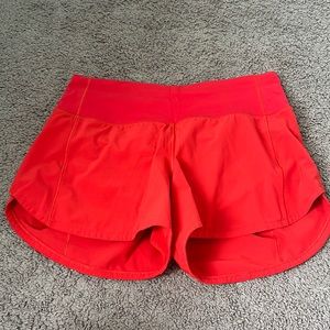 lululemon speed up mid rise 4” shorts, carnation red, size 4